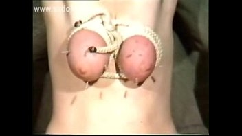 horny slave got her big tits tied up pornoteen with a rope and got large needles in her boobs by master 